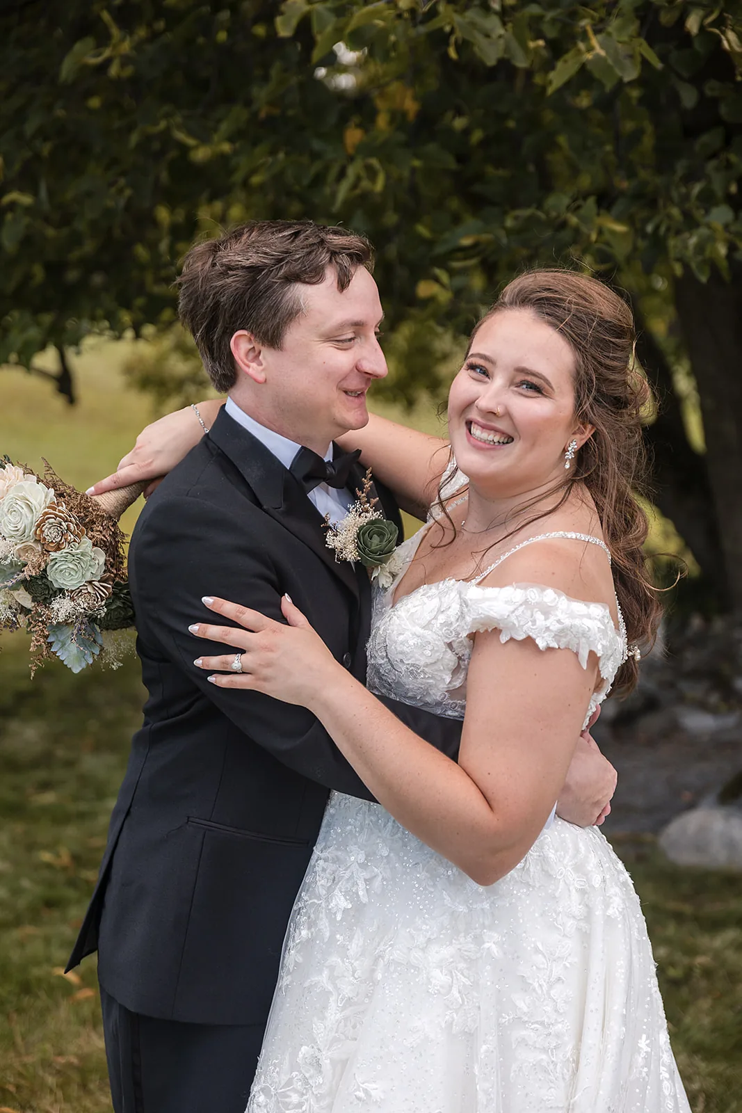 couple side by side portrait golden hour field