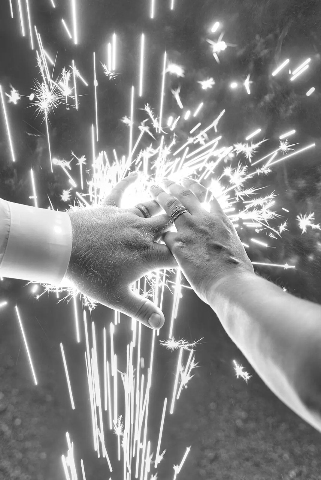 Black white close two hands holding — Chelsea & Jake's wedding at Ogemaw County Fairgrounds, West Branch, MI