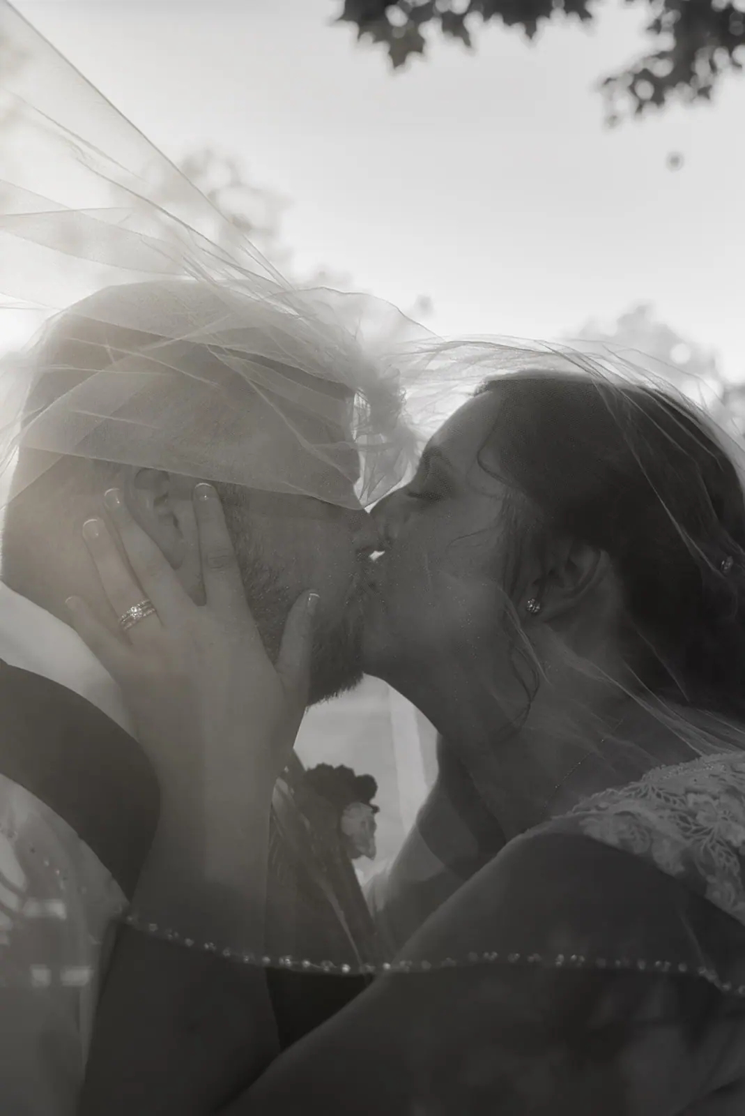 Black white silhouette couple kissing veil — Chelsea & Jake's wedding at Ogemaw County Fairgrounds, West Branch, MI