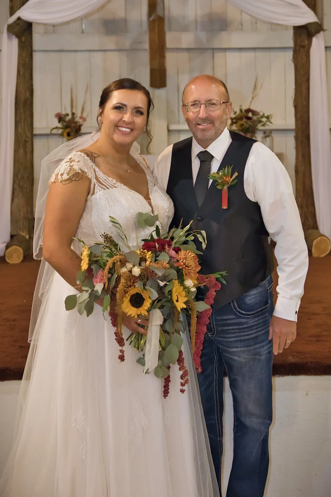 Bride father barn ceremony space bouquet — Chelsea & Jake's wedding at Ogemaw County Fairgrounds, West Branch, MI