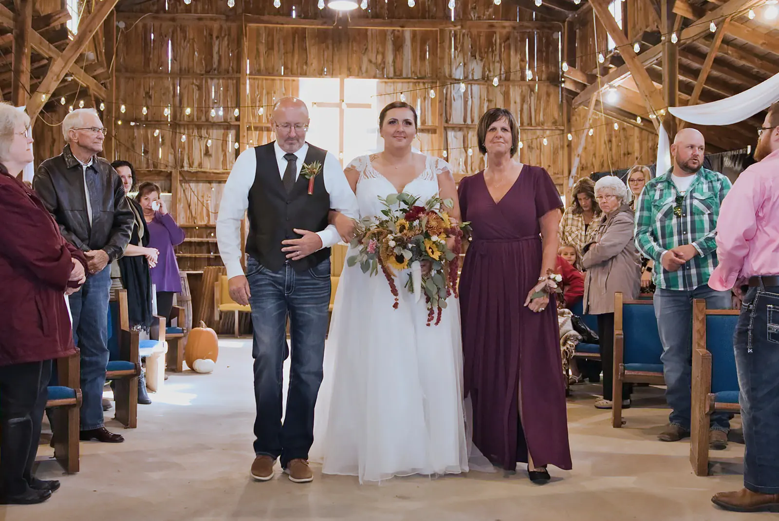 Bride groom walking aisle family member — Chelsea & Jake's wedding at Ogemaw County Fairgrounds, West Branch, MI