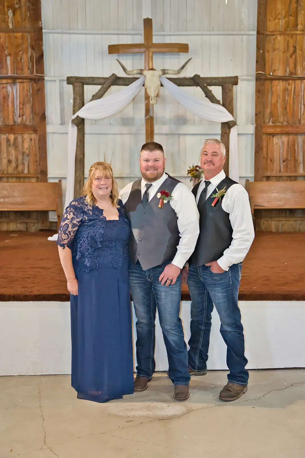 Bride s family group front barn — Chelsea & Jake's wedding at Ogemaw County Fairgrounds, West Branch, MI