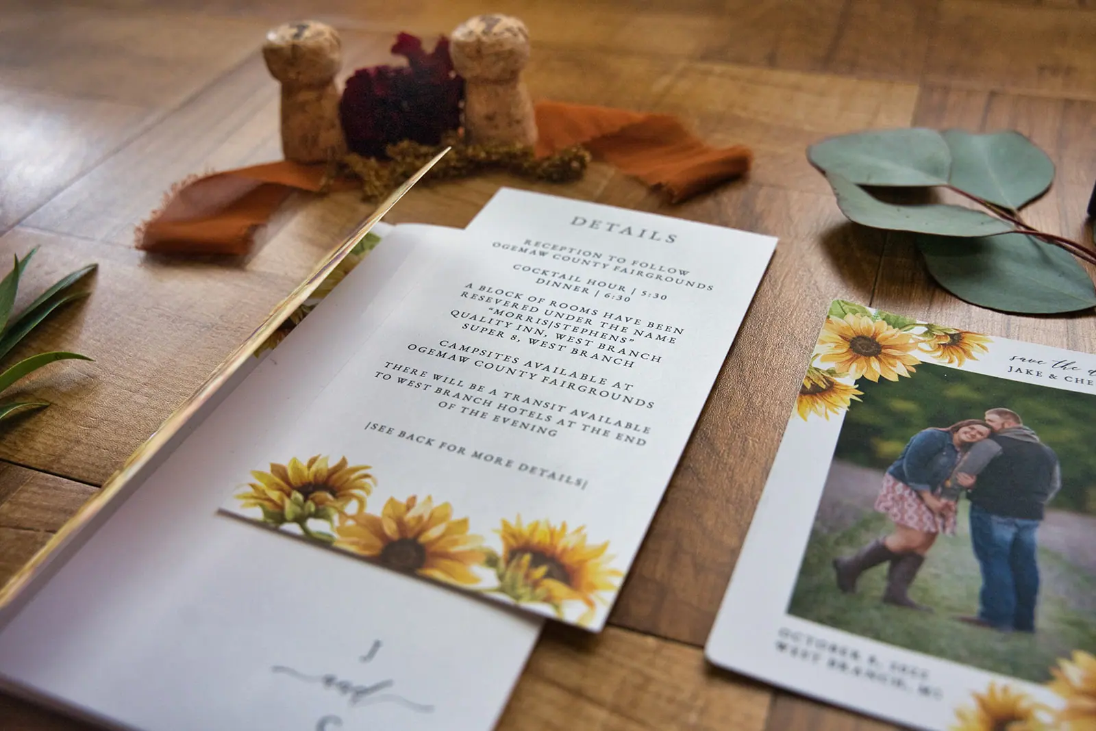 Invitation suite sunflowers photo envelope wooden — Chelsea & Jake's wedding at Ogemaw County Fairgrounds, West Branch, MI