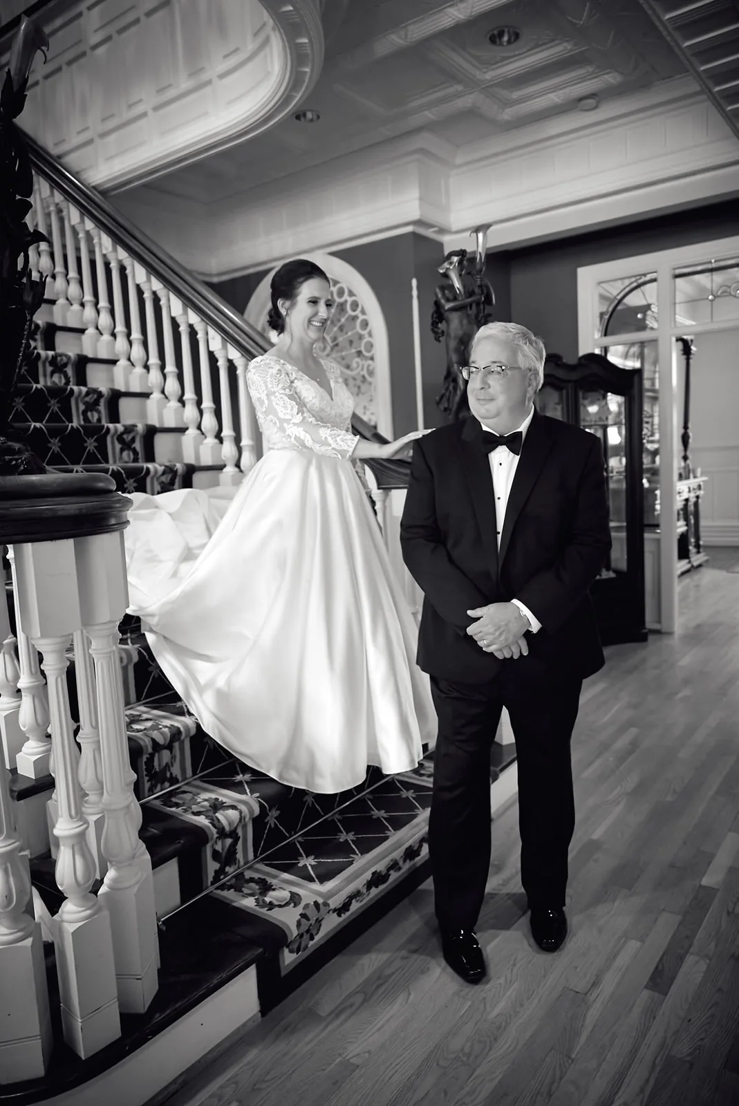bw bride and groom embracing indoors, candid dance moment