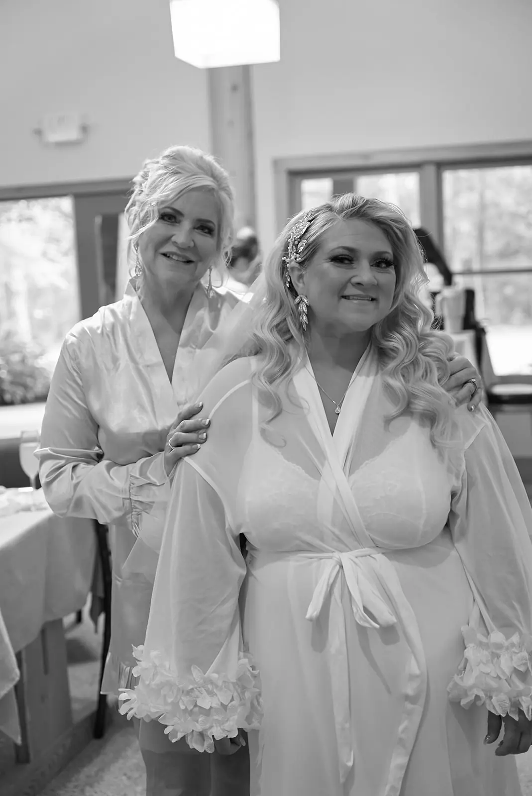 Black white bride mother white robes — Erika & Corey's wedding at Sojourn Lakeside Resort, Gaylord, MI
