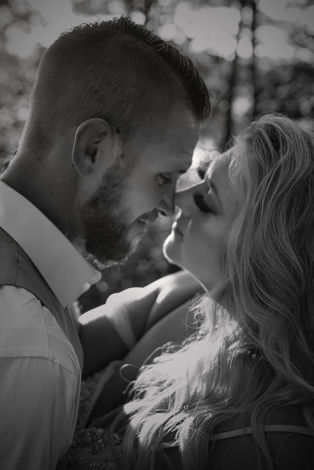 Black white close couple nose nose — Erika & Corey's wedding at Sojourn Lakeside Resort, Gaylord, MI
