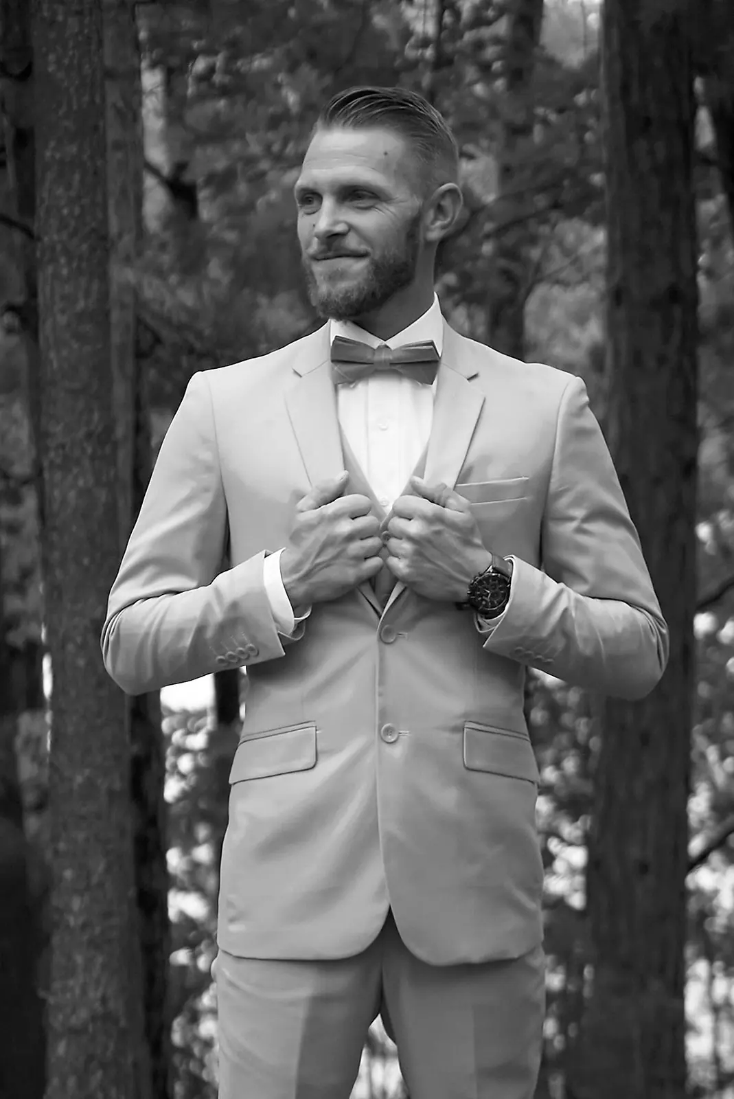 Black white groom suit bow tie — Erika & Corey's wedding at Sojourn Lakeside Resort, Gaylord, MI