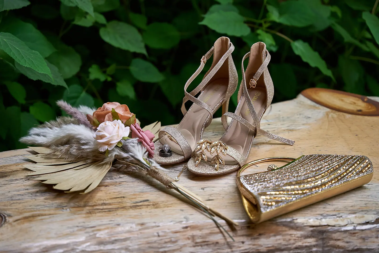 Bridal heels beaded clutch log dried — Erika & Corey's wedding at Sojourn Lakeside Resort, Gaylord, MI