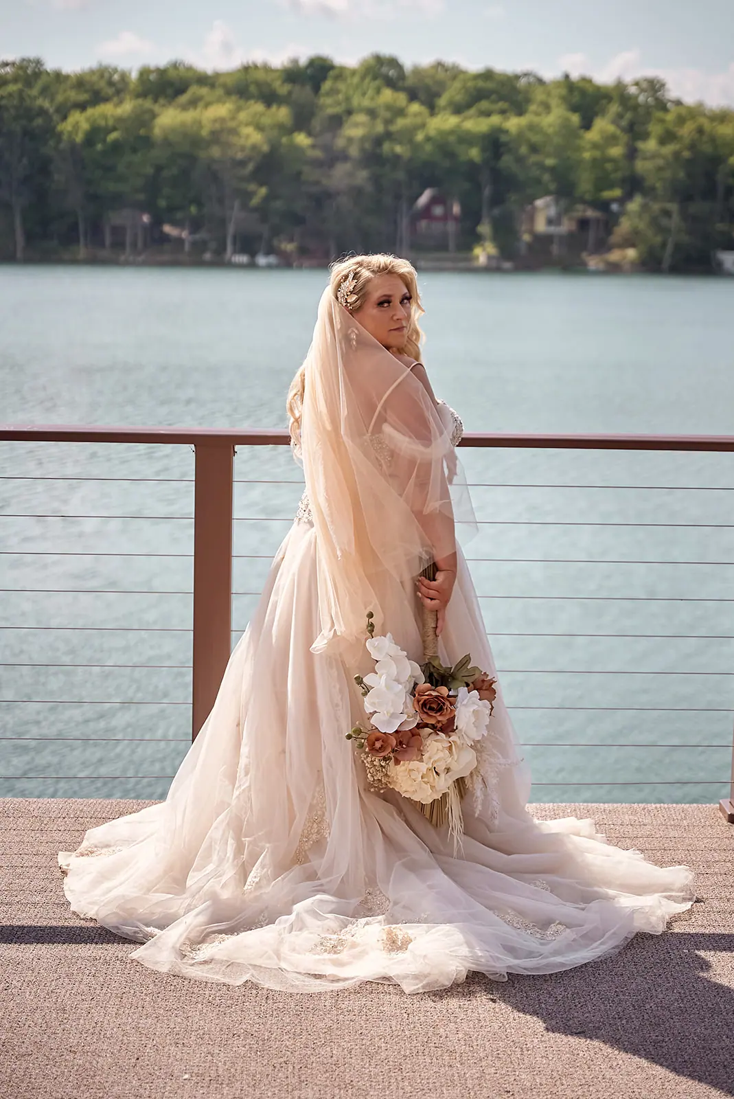 Bride veil gown bouquet dock lake — Erika & Corey's wedding at Sojourn Lakeside Resort, Gaylord, MI