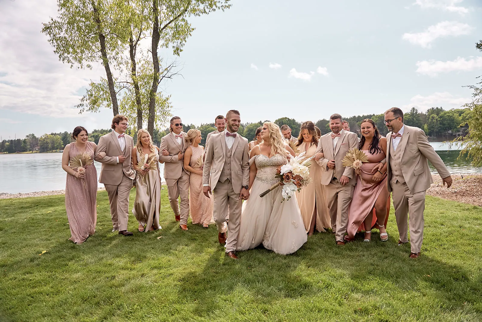 Wide bridal party group photo bride — Erika & Corey's wedding at Sojourn Lakeside Resort, Gaylord, MI