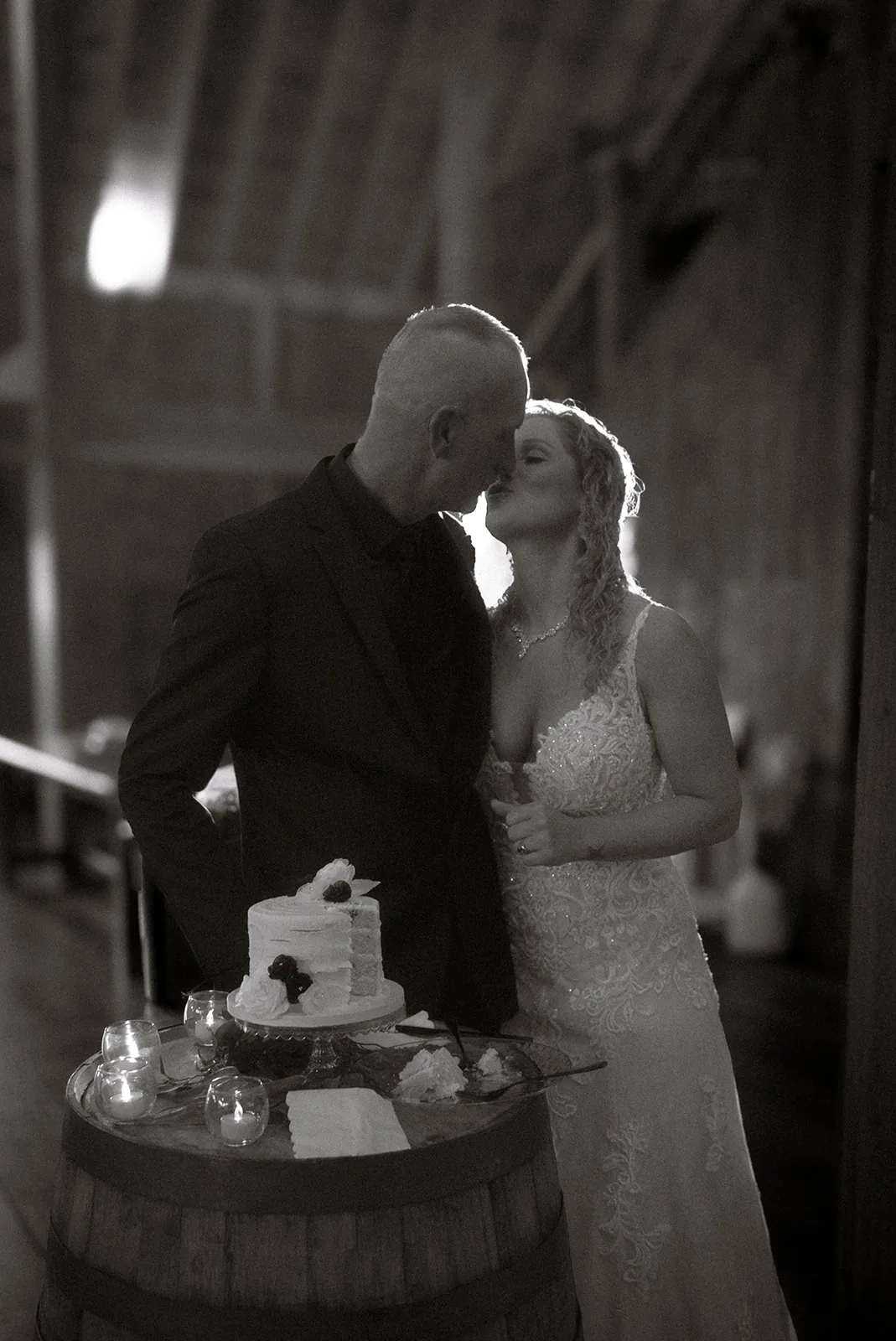 detail of cake cutting, hand holding knife on small cake