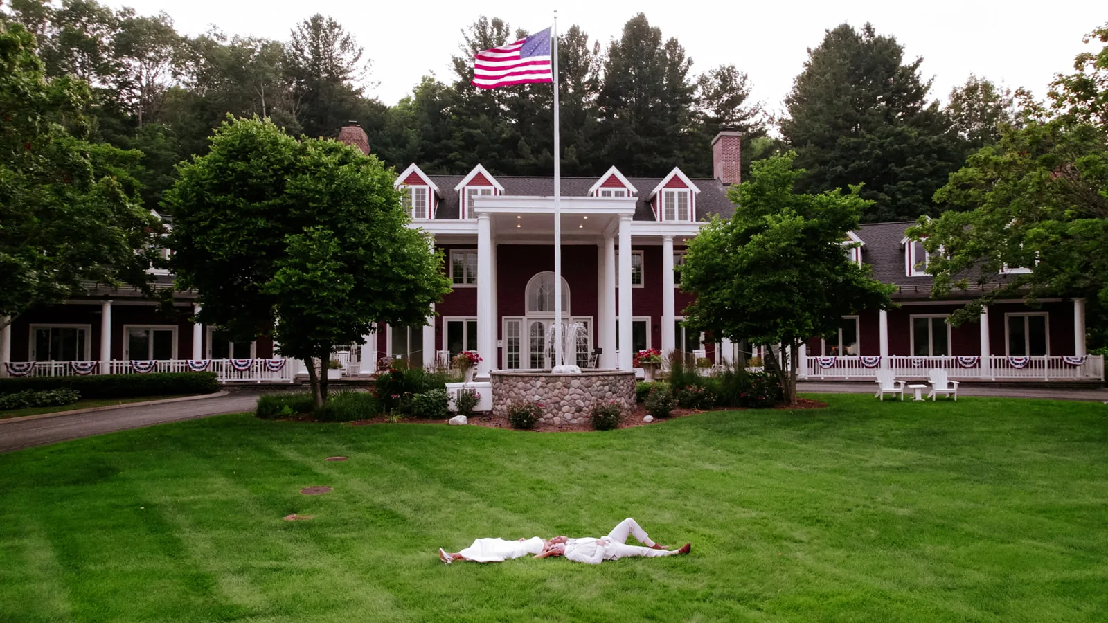 wide exterior shot of mansion venue lawn
