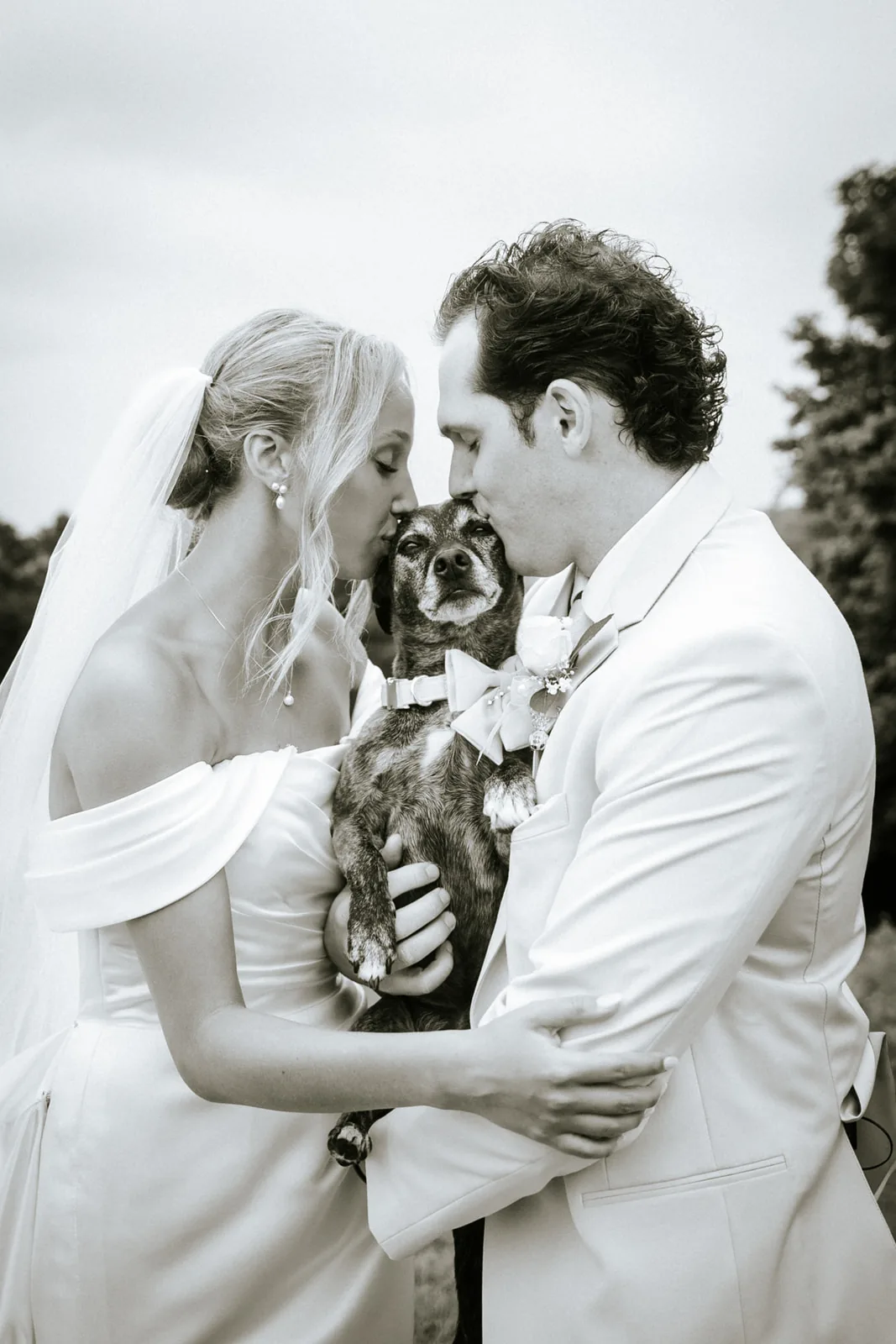 bw bride and groom close portrait, foreheads touching, warm smile
