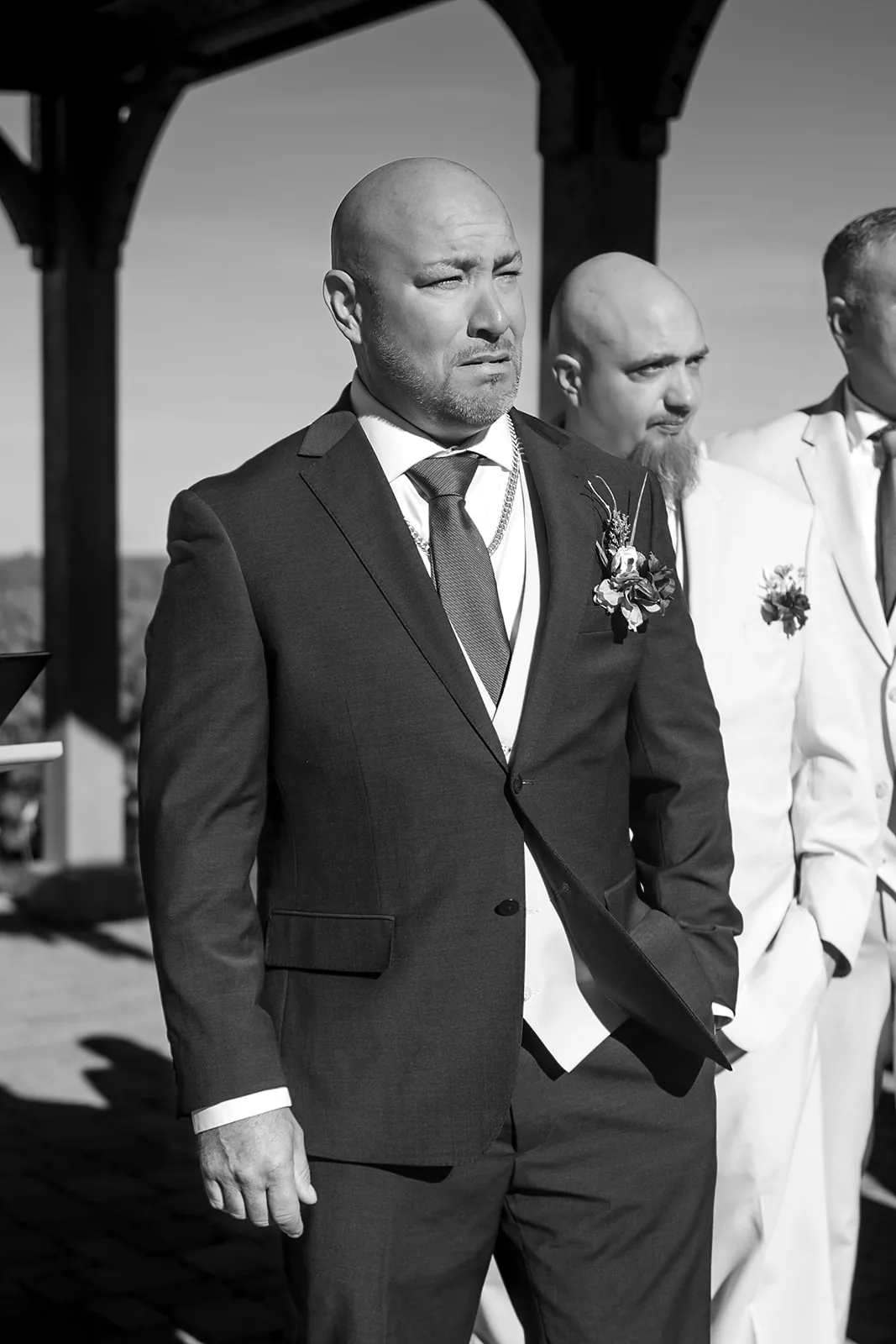 bw ring bearer boy walking down aisle with young girl