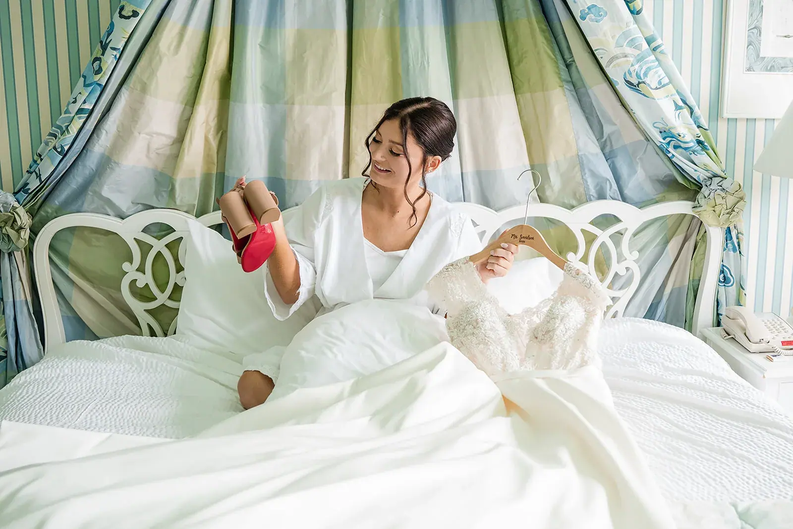 Bride getting ready canopy bed — Jennifer & Parker's wedding at the Grand Hotel, Mackinac Island