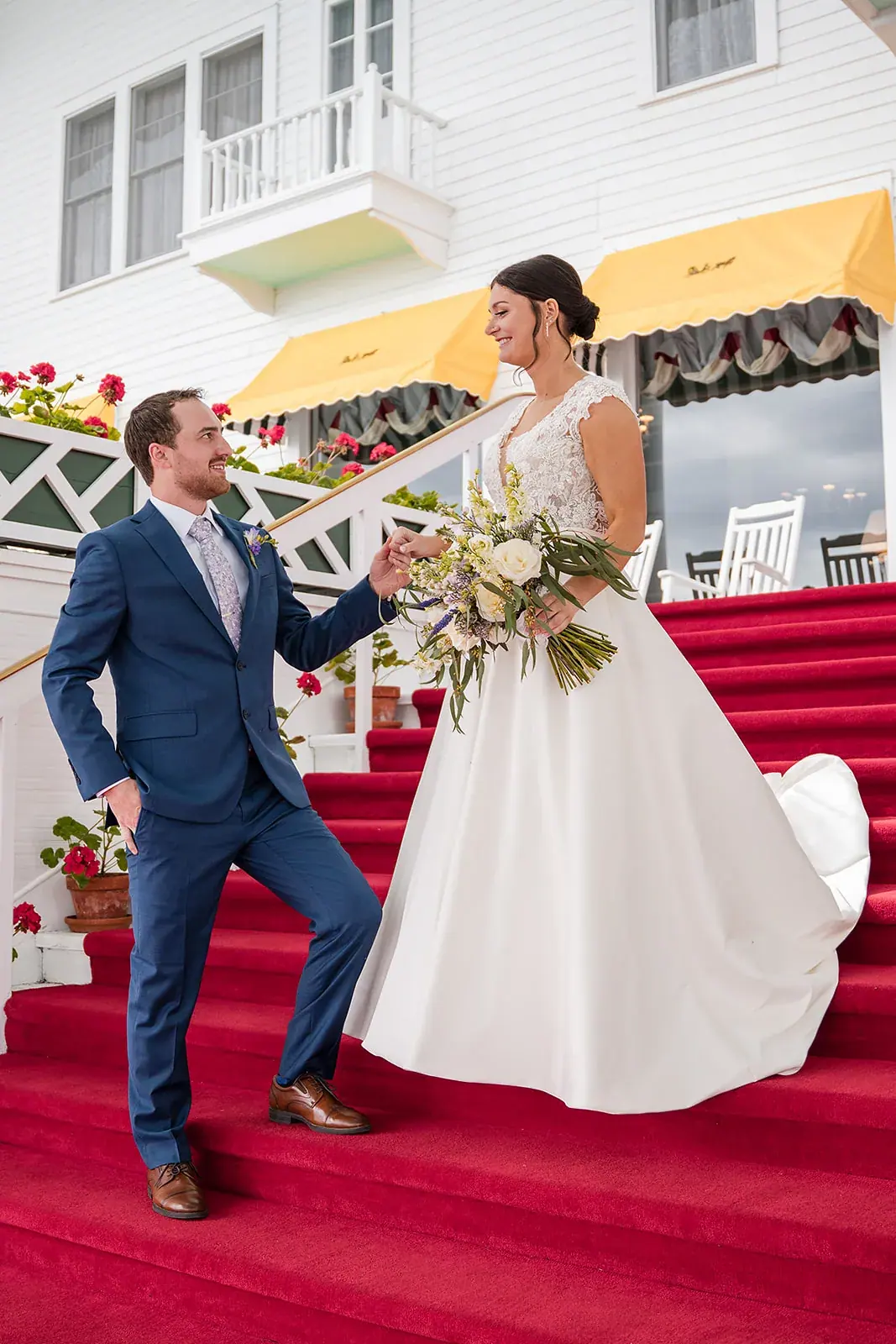 Bride and groom red carpet steps — Jennifer & Parker's wedding at the Grand Hotel, Mackinac Island