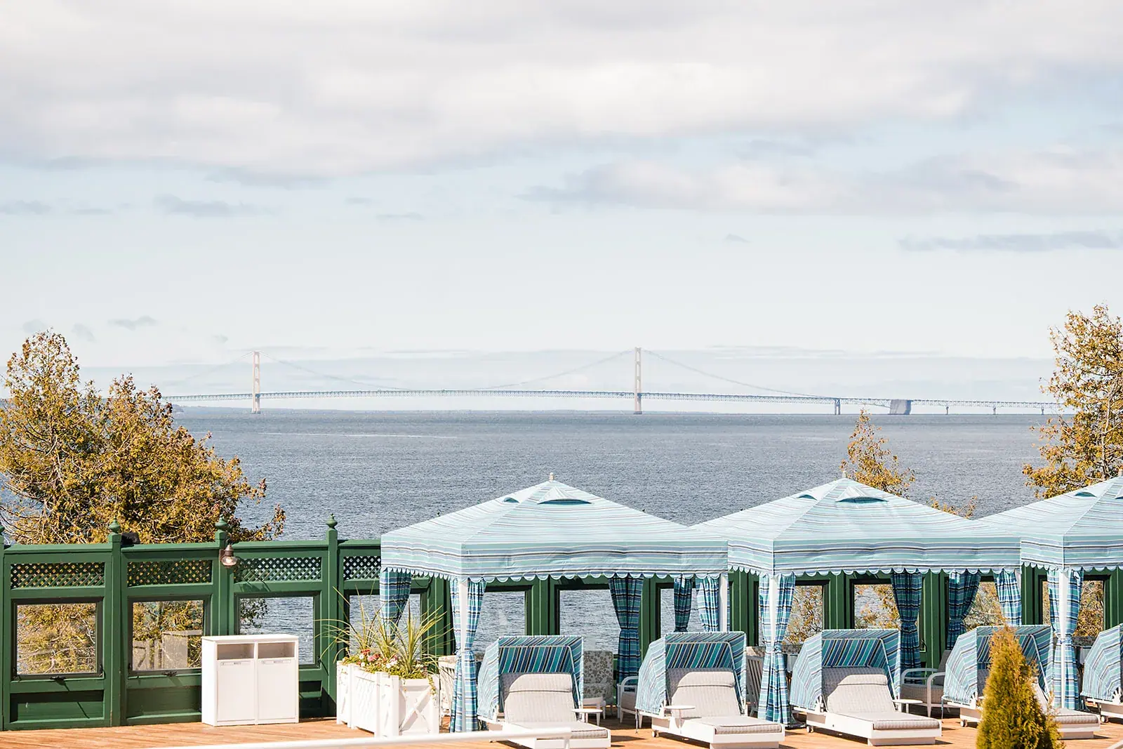 Cabanas overlooking mackinac bridge — Jennifer & Parker's wedding at the Grand Hotel, Mackinac Island