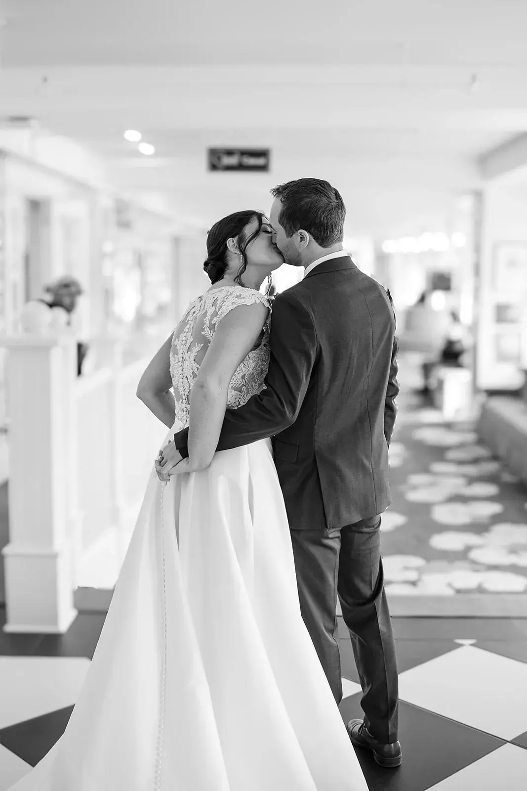 First look kiss in black and white — Jennifer & Parker's wedding at the Grand Hotel, Mackinac Island