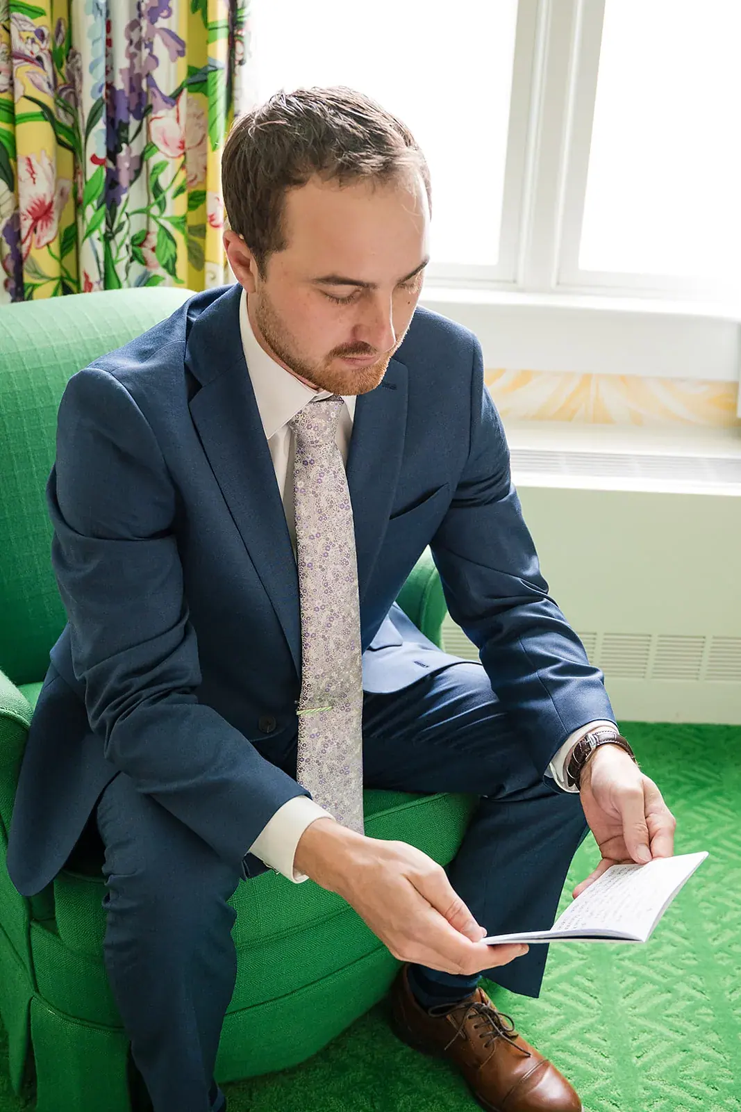 Groom reading letter — Jennifer & Parker's wedding at the Grand Hotel, Mackinac Island