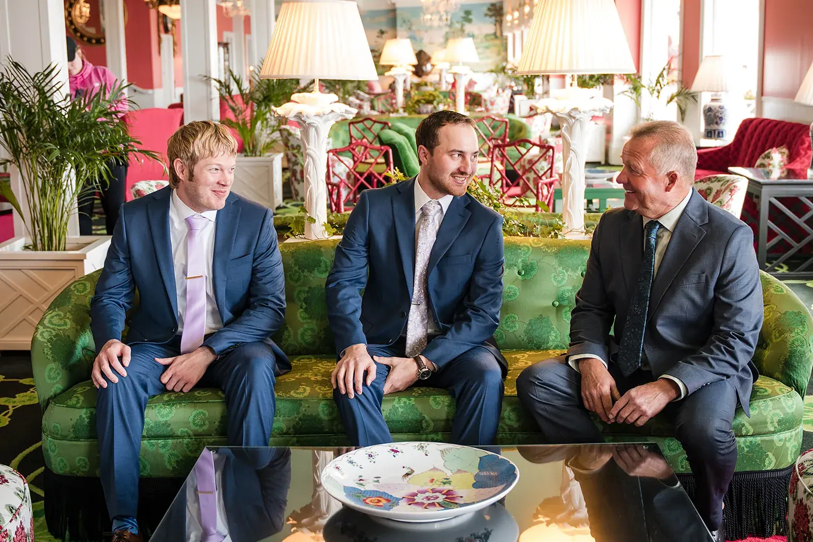 Groomsmen green sofa — Jennifer & Parker's wedding at the Grand Hotel, Mackinac Island