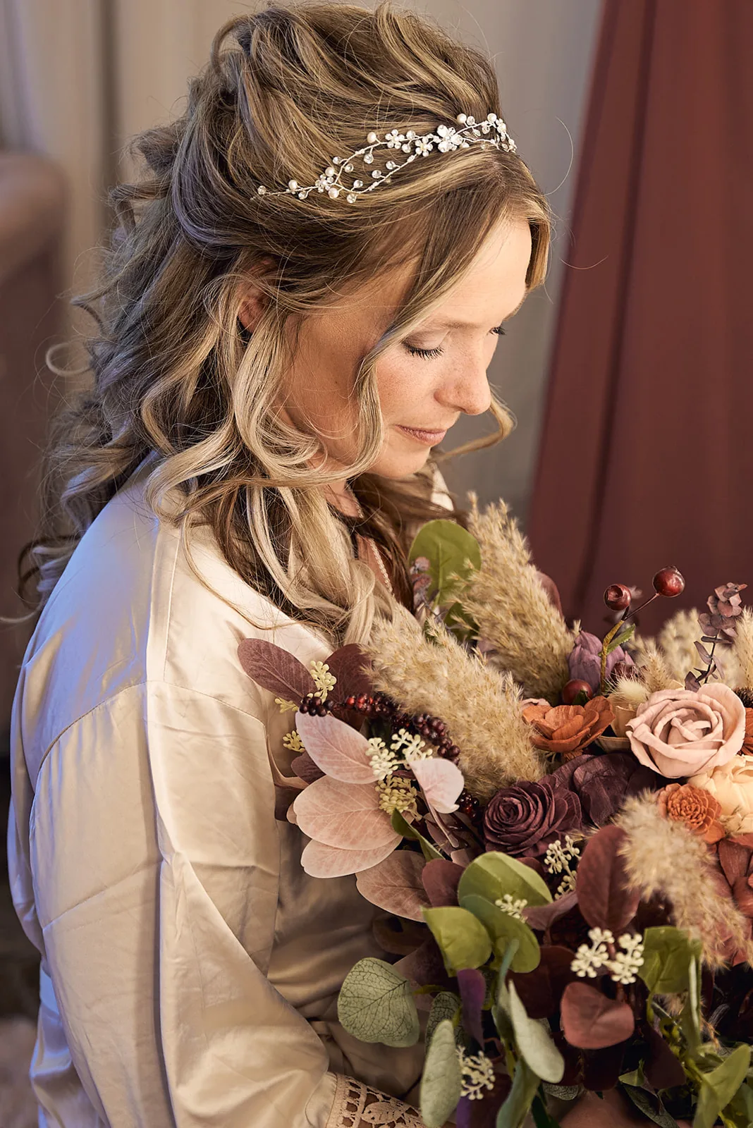 bride portrait with floral crown indoors, soft light