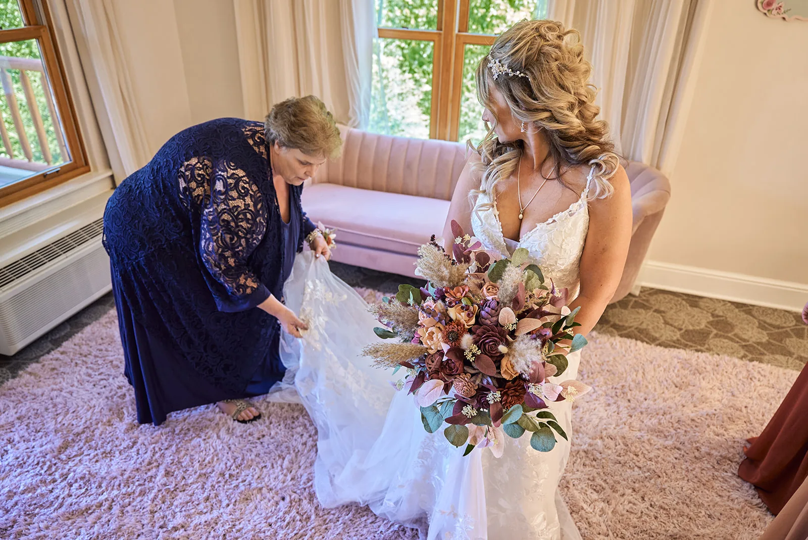 bride portrait with floral crown, looking down, soft smile