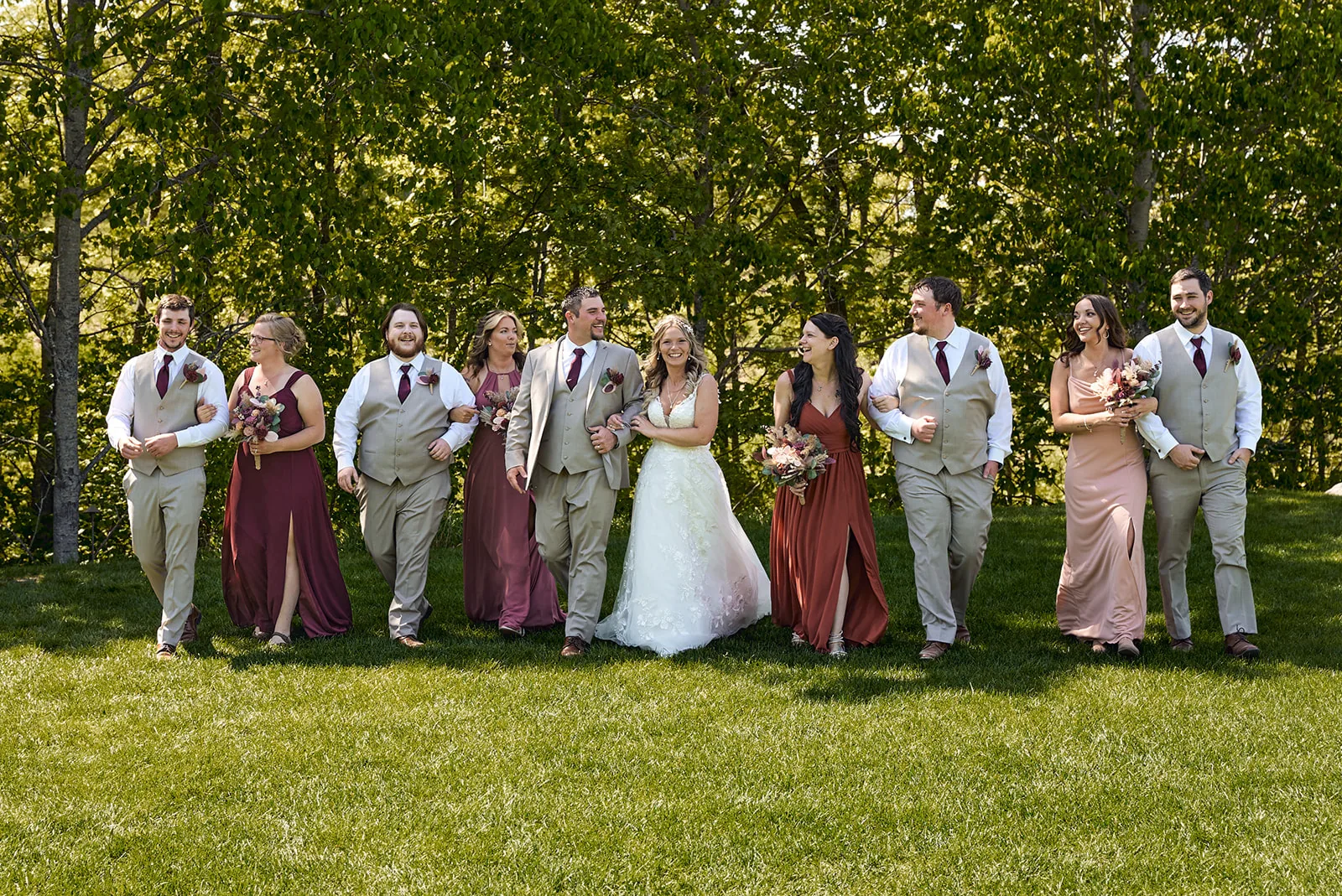 full wedding party group portrait on lawn