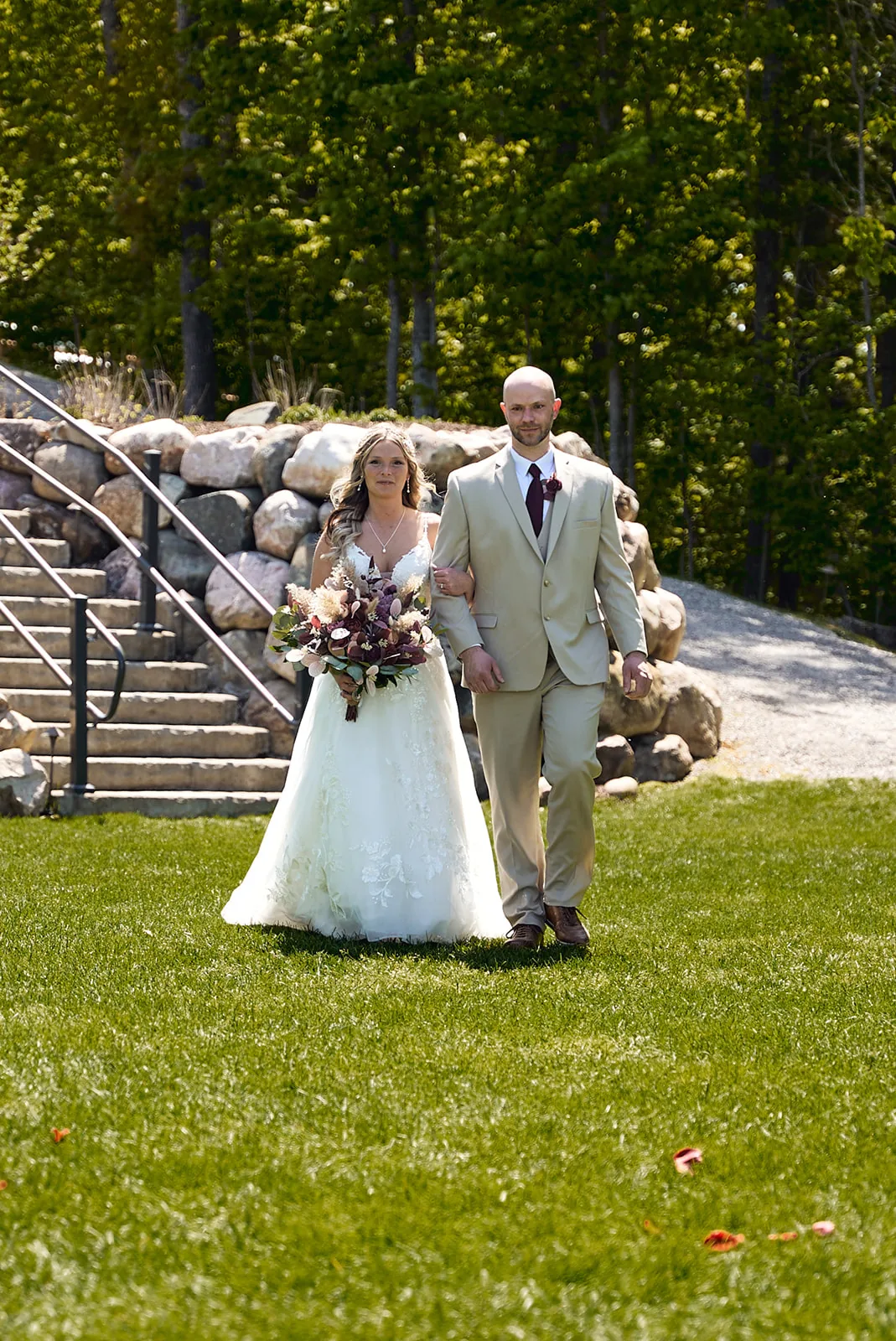 bride portrait on deck with bridesmaids, bouquets, group