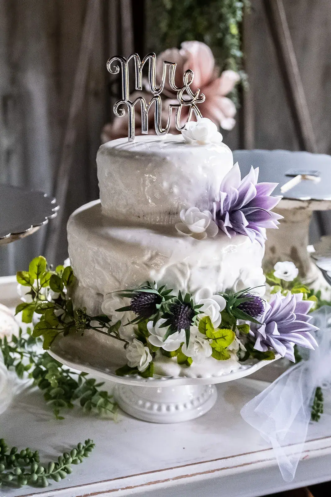 Wedding cake thistle flowers — Jessica & Joel's wedding at The Rut Hutt, Gaylord