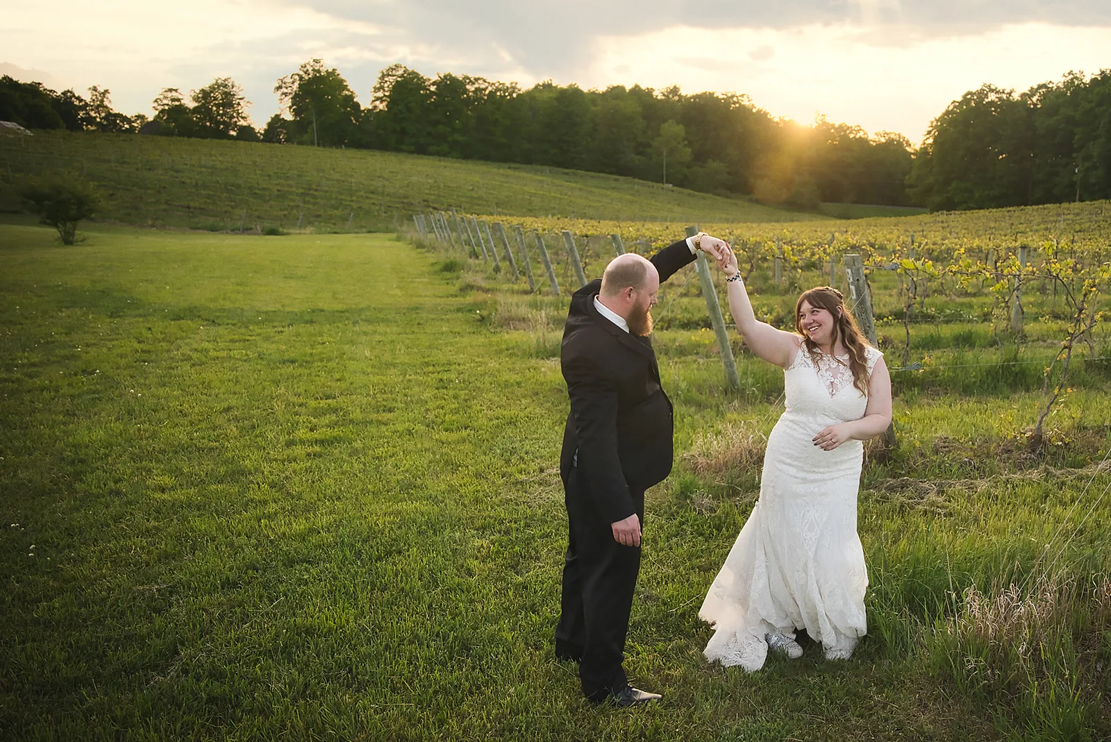 bride solo portrait against winery logo wall