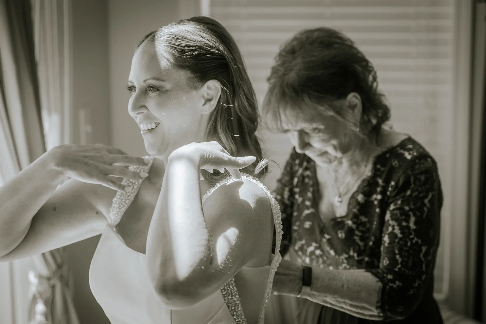 bw mother and bride candid moment, getting ready