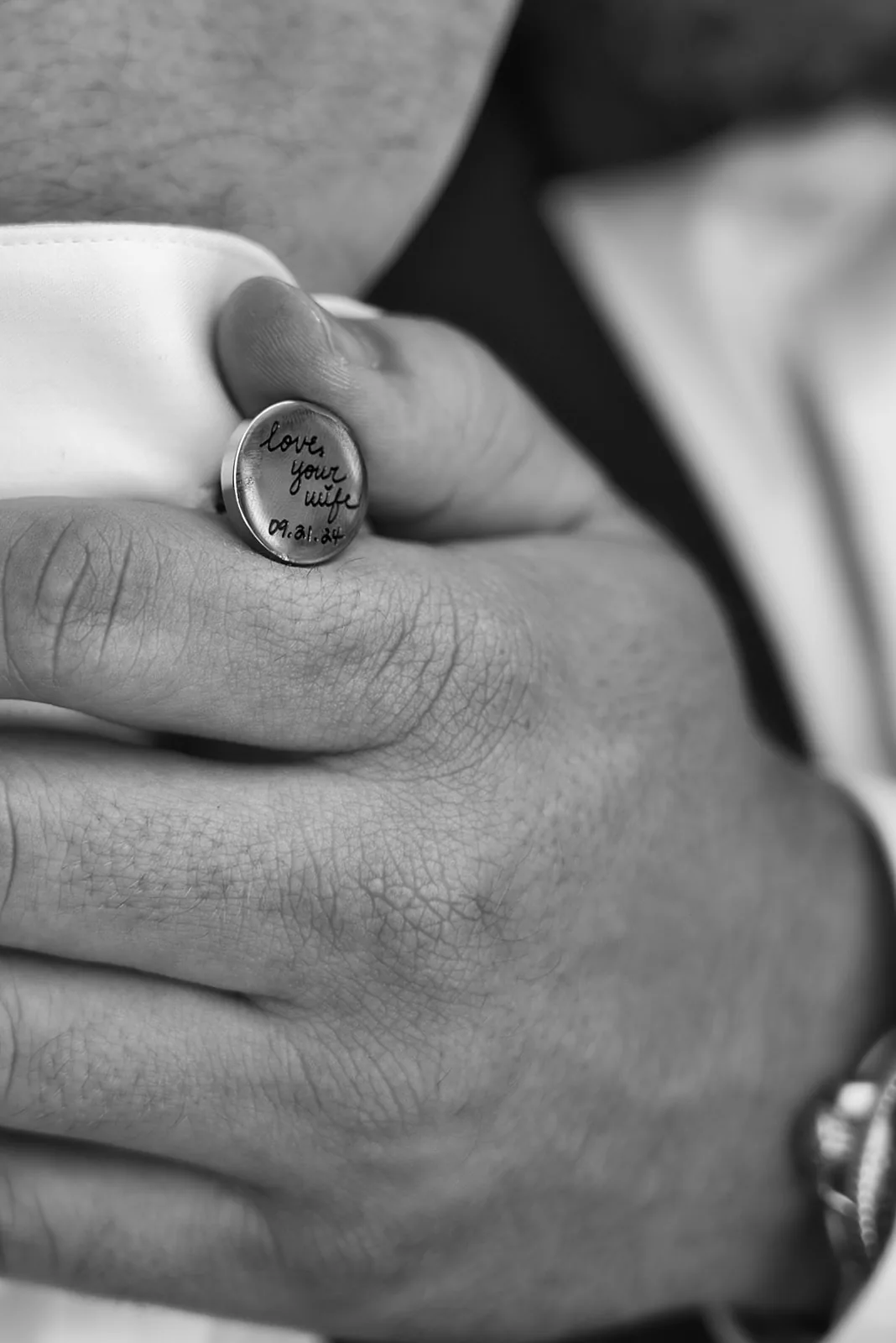 groom solo portrait seated by window, getting ready