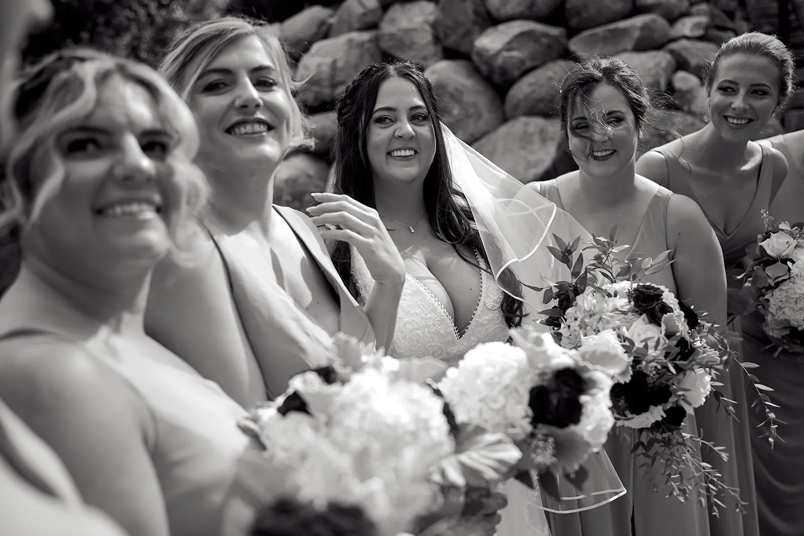 Black white bride bridesmaids pressed close — Taylor & Mark's wedding at The Manor at Fire Tower Hill, Lewiston, MI