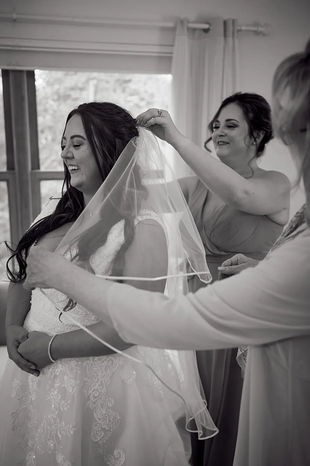 Black white bride s veil being — Taylor & Mark's wedding at The Manor at Fire Tower Hill, Lewiston, MI