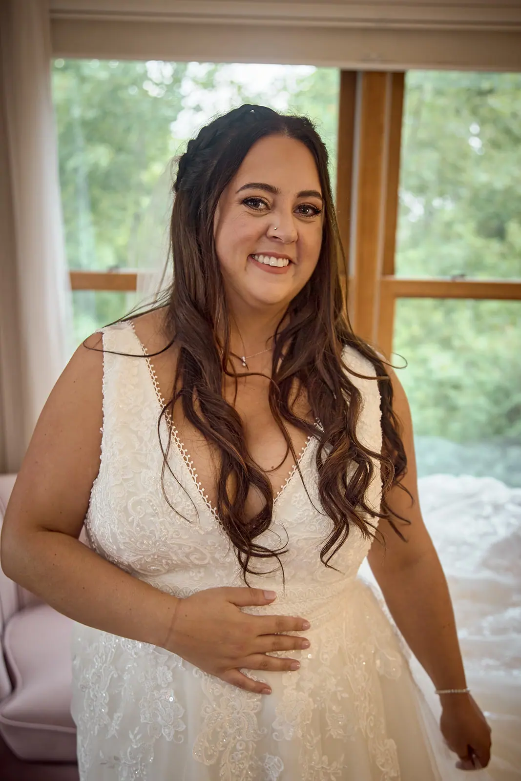 Bride smiling gown window — Taylor & Mark's wedding at The Manor at Fire Tower Hill, Lewiston, MI