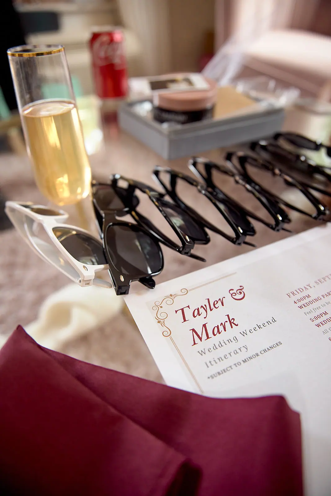 Champagne glass sunglasses card taylor mark — Taylor & Mark's wedding at The Manor at Fire Tower Hill, Lewiston, MI
