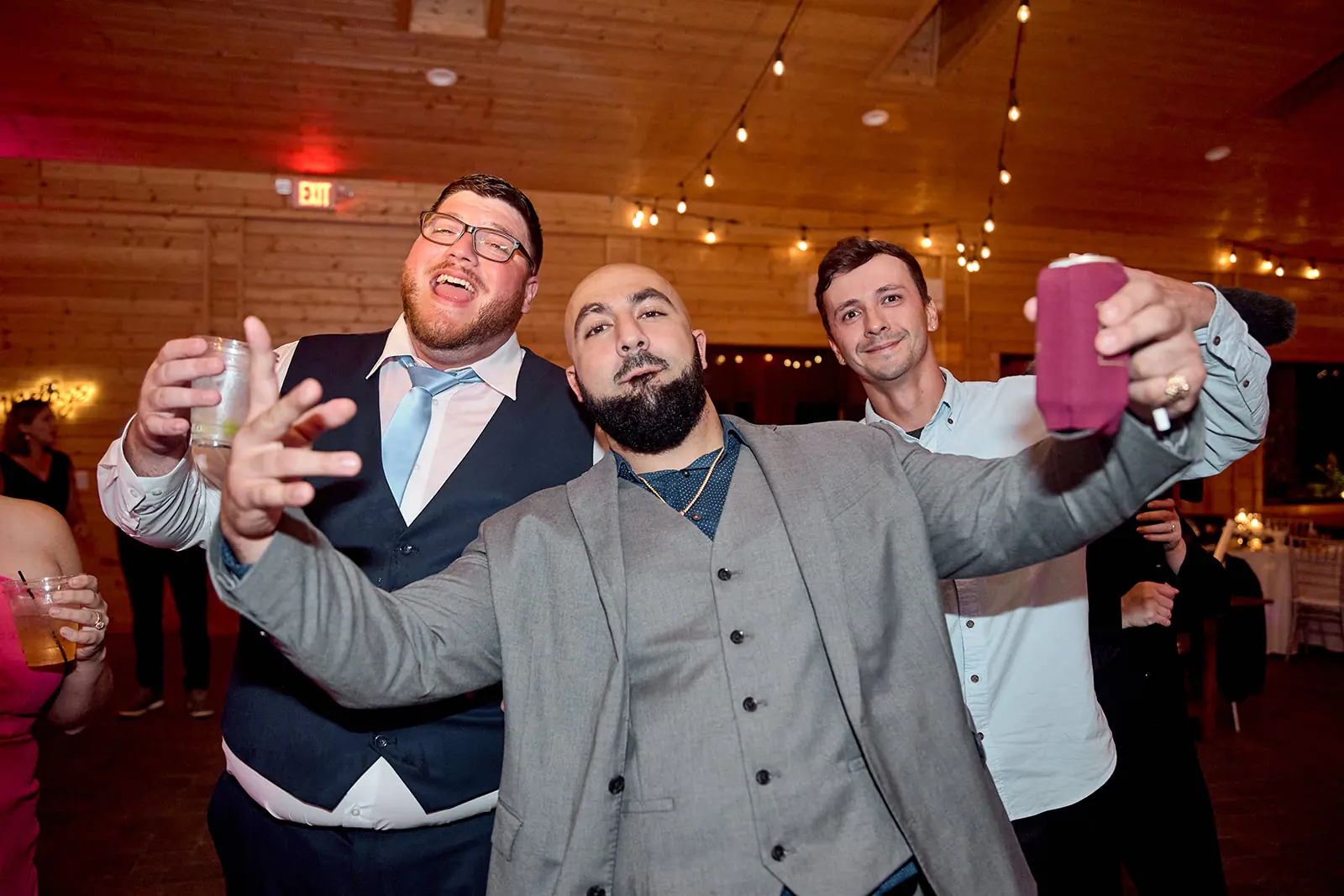 Groomsmen posing selfie dance floor — Taylor & Mark's wedding at The Manor at Fire Tower Hill, Lewiston, MI