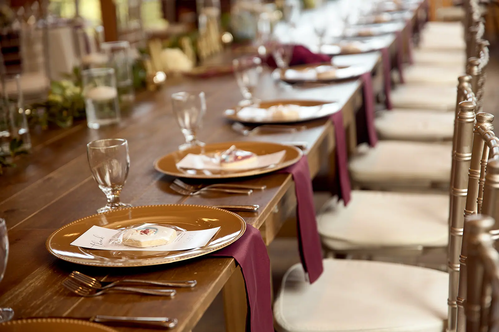 Long reception table burgundy runners gold — Taylor & Mark's wedding at The Manor at Fire Tower Hill, Lewiston, MI