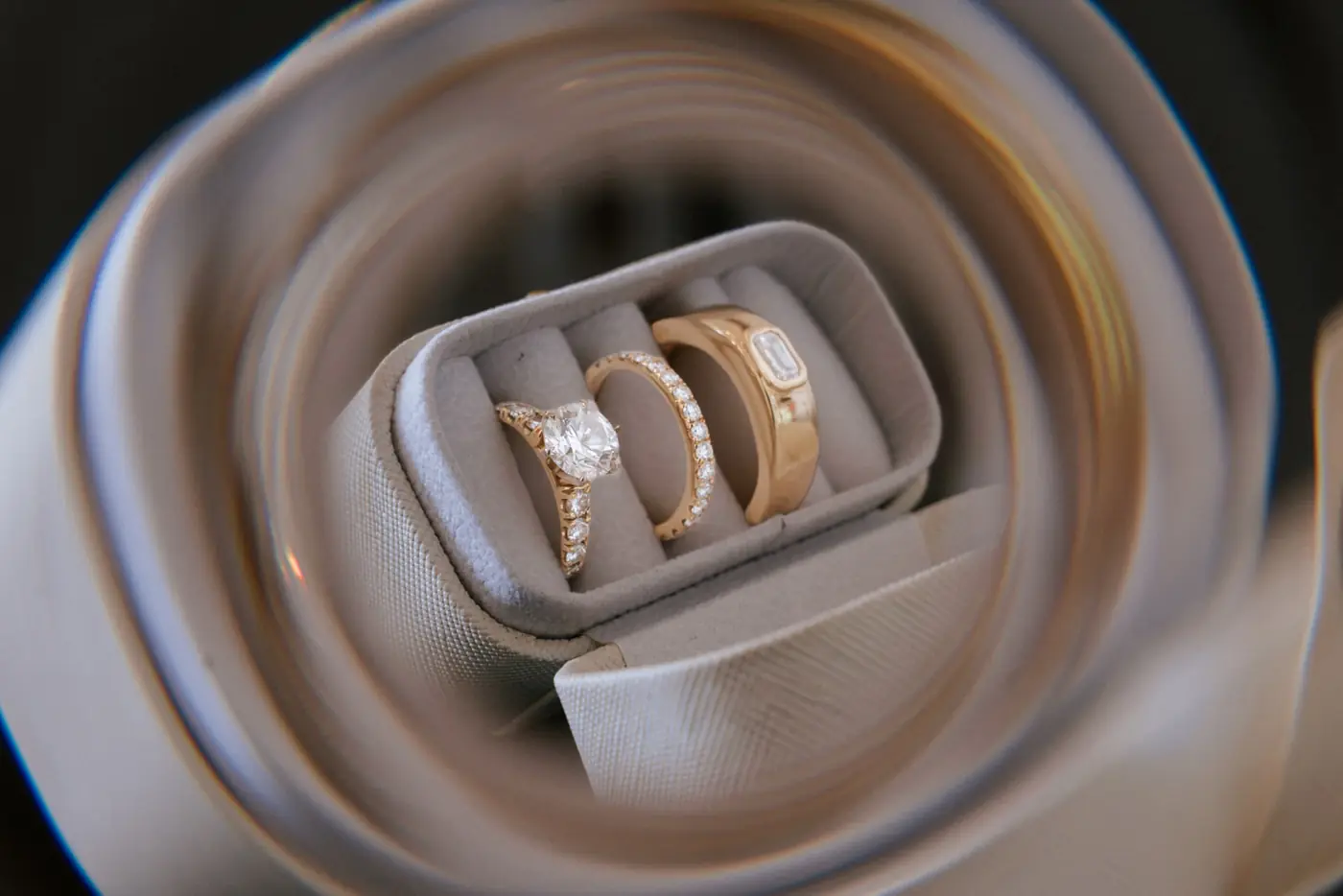 Wedding rings resting in a travel ring box
